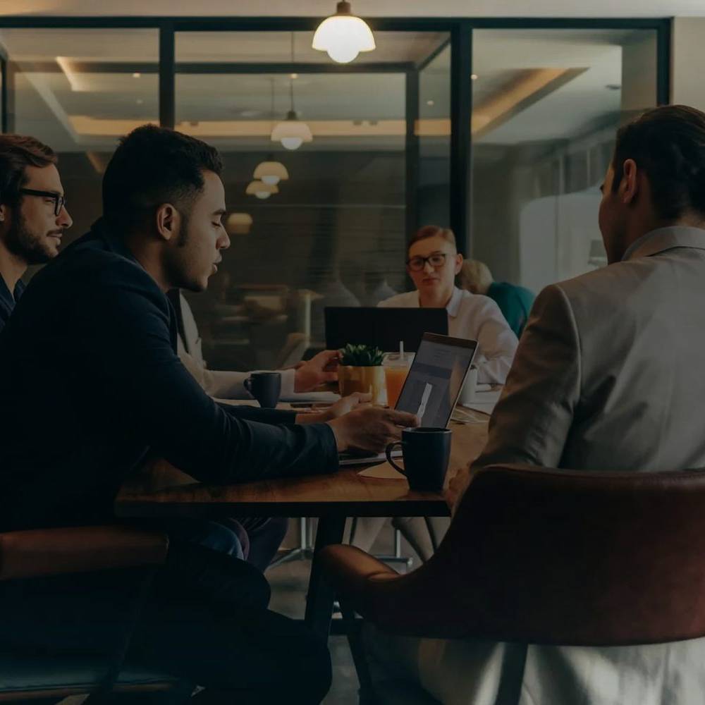 A team meeting in a modern office, getting started with automation, Dragonfly Tech
